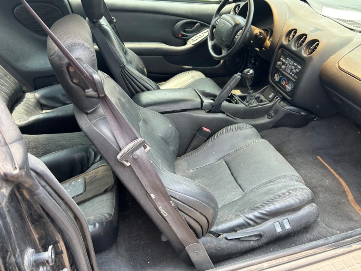 2002 Black Pontiac Firebird Formula Coupe (2G2FV22G522) with an 5.7L V8 OHV 16V engine, located at 1687 Business 35 S, New Braunfels, TX, 78130, (830) 625-7159, 29.655487, -98.051491 - Photo#2